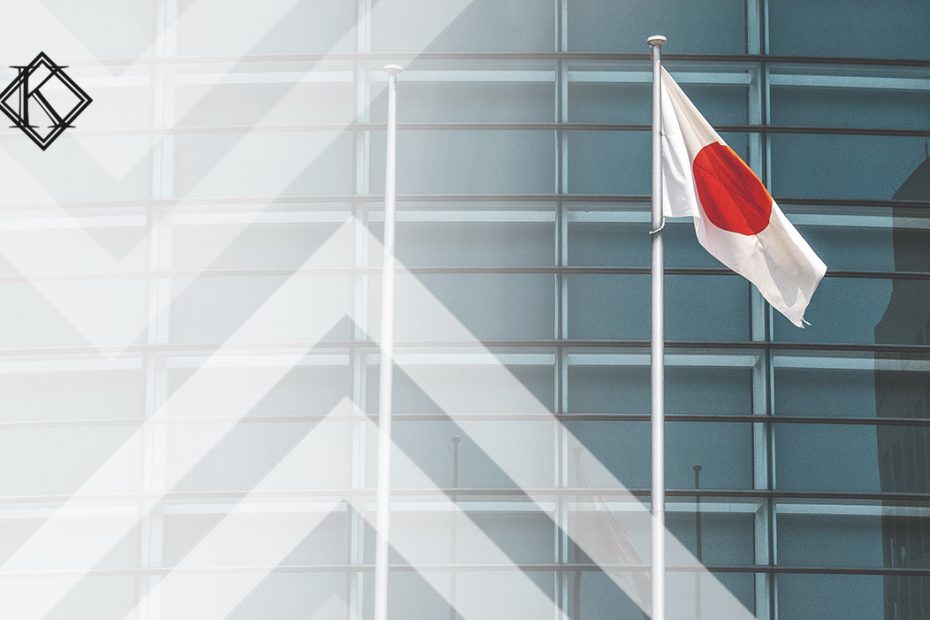 A imagem mostra uma bandeira do Japão em frente a um prédio, e ilustra a publicação 